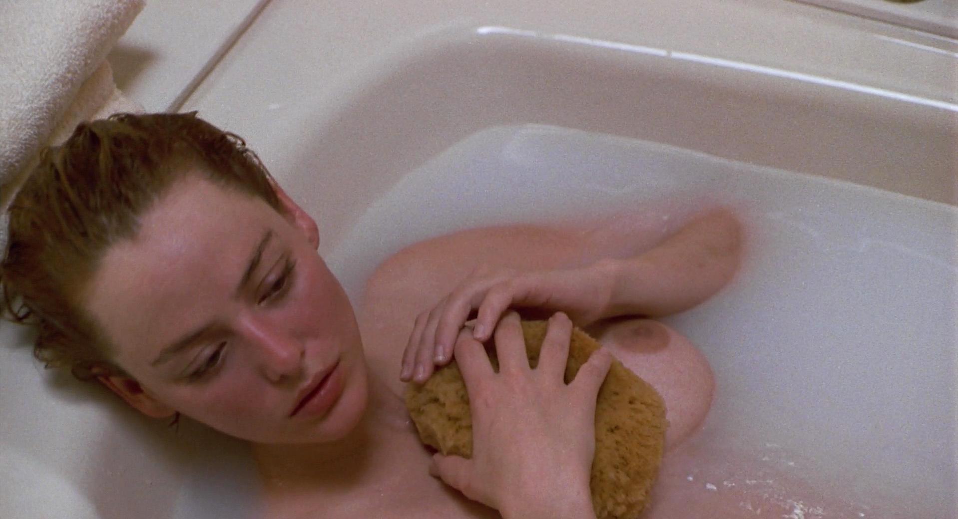 Virginia Madsen nude - Candyman (1992)